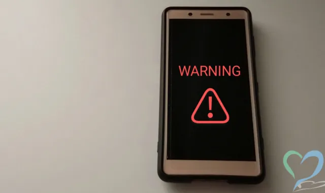 スマホにWARNINGの文字