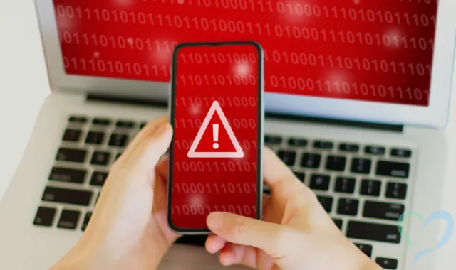 赤い画面のPCとスマホ